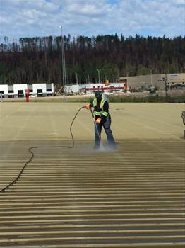 Pressure cleaning warehouse roof